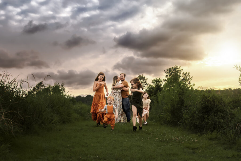 Family plays brisbane field photoshoot family photography