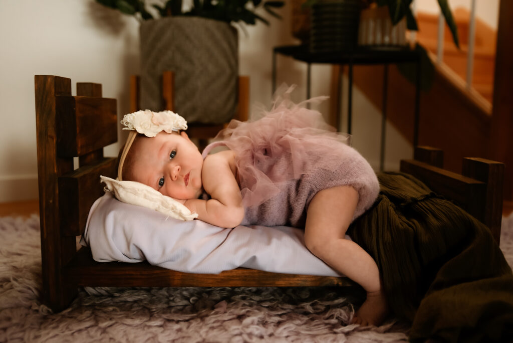 Newborn baby resting peacefully at home after natural birth in Brisbane