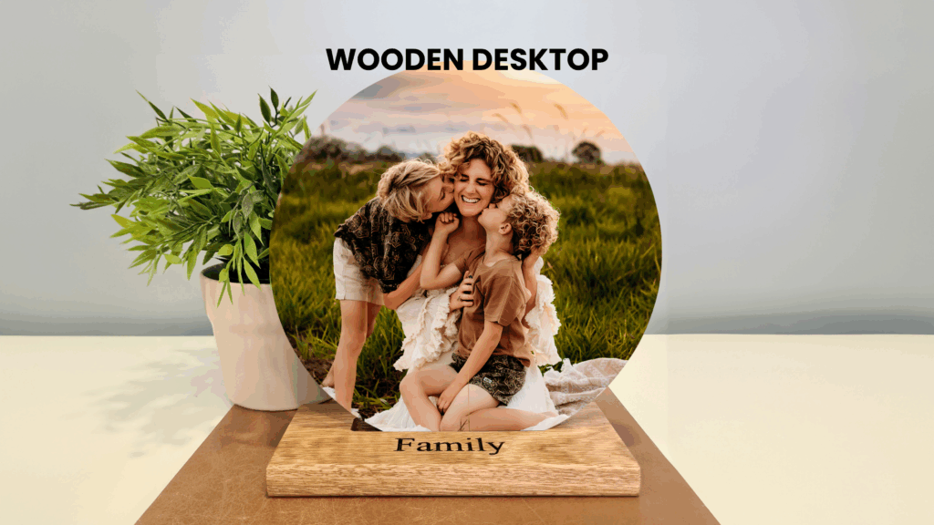 A wooden photo block displayed on a desk, featuring a warm family portrait printed on natural wood grain.